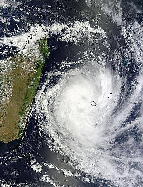 Tropical Cyclone Dumile over La Reunion Island and Mauritius was captured by satellite on 3 January 2013. Dumile's center was just northwest of Reunion (left) and Mauritius (right). The large island to the left is Madagascar. Image courtesy of NASA Goddard MODIS Rapid Response Team.
