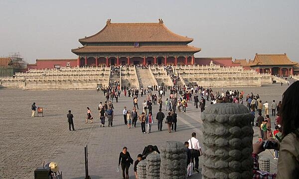 The Hall of Supreme Harmony as seen from the Inner Courtyard of the Forbidden City in Beijing, China. The Hall was destroyed by fire seven times and was last rebuilt in 1695-97. Many buildings in the Forbidden City were built from precious woods and marble, with golden bricks used for floors.