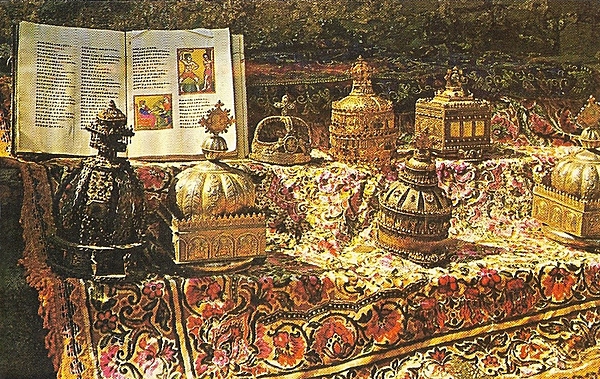 National treasures -- reliquaries, crowns, and an ancient velum book -- from the Church of Our Lady Mary of Zion in Axum, Ethiopia. The church also claims to have the Ark of the Covenant, but only a single guardian monk, appointed for life, may view and pray before the Ark.