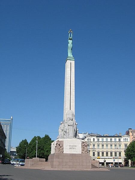The Riga Freedom Statue is in the center of Riga, Latvia, near the old town. It honors soldiers killed in the Latvian War for Independence (1918-20). The monument, built in the early 1930's and unveiled in 1935, is 42 m (138 ft) high and is constructed of granite, travertine, and copper. At the top of the column is a copper figure of Liberty; the sculptures and bas-reliefs at the base depict Latvian culture and history.