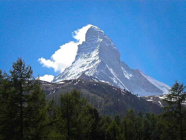 The Matterhorn is a pyramidal mountain on the border between Switzerland and Italy. At 4,478 m (14,692 ft) high, it is one of the highest and most famous peaks in the Alps.
