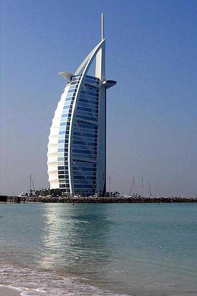 The Burj-al-Arab Hotel in Dubai, UAE, is one of the world's tallest hotels. Its distinctive shape is meant to mimic an Arab dhow (sailing vessel).
