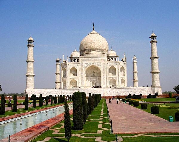 The Taj Mahal was built by Emperor Shah Jahan between 1632 and 1653 to honor the memory of his favorite wife. Located 200 km (125 mi) from New Delhi in Agra, it took nearly 22 years, 22,000 workers, and 1,000 elephants to complete the white marble mausoleum. The structure became a UNESCO World Heritage Site in 1983.