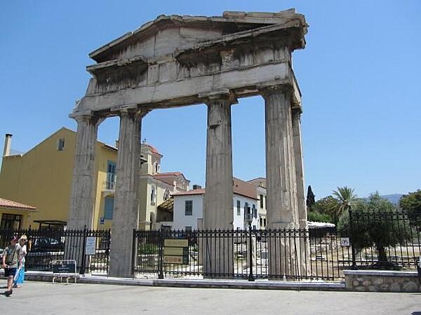 Entrance arch into the Roman Agora and Tower of the Winds in Athens, Greece. The Romans used this area as the principal marketplace and agora beginning in the 1st century A.D. It was the commercial and administrative center of the city until the 19th century.