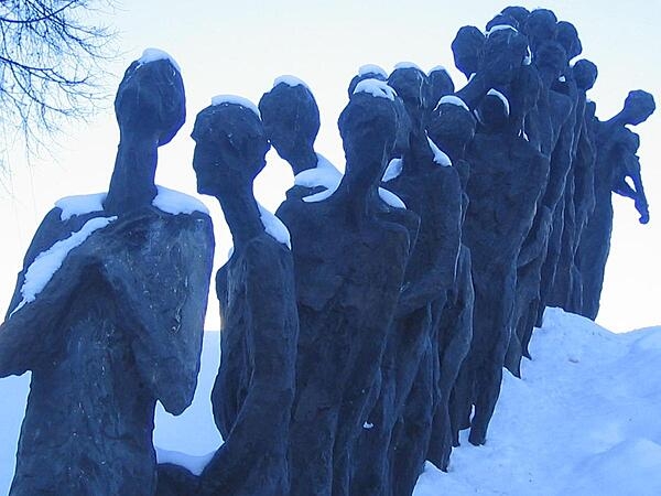 A view of the Yama (Death Pit) Holocaust Memorial in Minsk. The figures are part of a group descending into the pit to be executed.