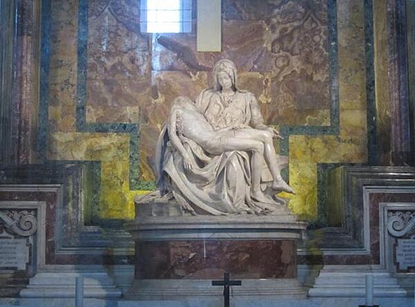 At age 24, Michelangelo Buonarroti was commissioned by French Cardinal Jean de Bilhères to sculpt La Pietà  (meaning "compassion" in Italian) for the cardinal's funerary chapel in St. Peter's Basilica in Vatican City. In the 18th century, the 174 cm x 195 cm (68.5 in x 76.8 in) masterpiece, carved from a single block of Carrara marble, was moved to its current site inside the basilica. Considered one of the finest sculptures ever crafted, it is the only piece Michelangelo signed, after he heard a passerby attribute the  work to someone else.