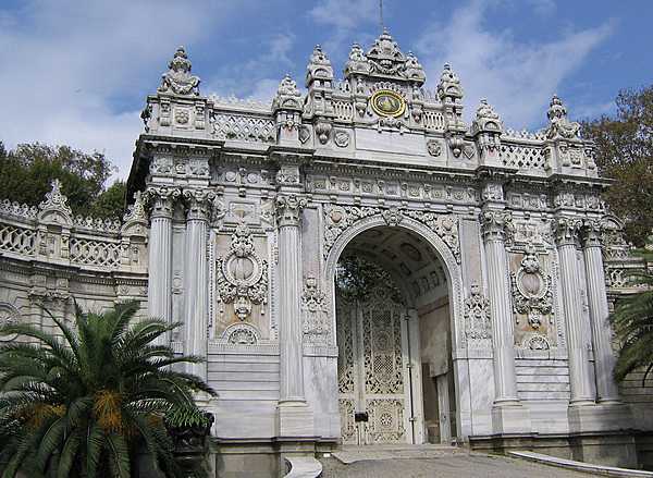 The Gate of the Sultan at the Dolmabahce Palace in Istanbul, Turkey. Built between 1843 and 1856, the palace served as the main administrative center of the Ottoman Empire from the second half of the 19th century through the early 20th century.
