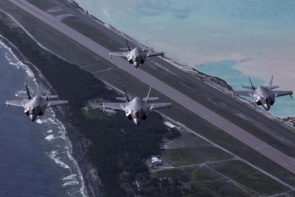 F-35B Lightning IIs with Marine Fighter Attack Detachment 211, the Wake Island Avengers, 13th Marine Expeditionary Unit (MEU), fly over Wake Island during a regularly scheduled deployment of the Essex Amphibious Ready Group (ARG) and the 13 MEU, 1 August 2018. Image courtesy of the US Air Force.