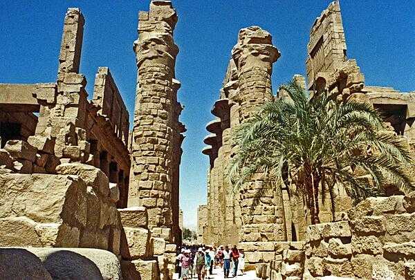 The ruins of Karnak Temple in Luxor, Egypt. The Karnak religious site was the largest in the ancient world and is sometimes referred to as "the Vatican of Egypt." It was composed of four sections, but only the Amun-Re is open to the public.