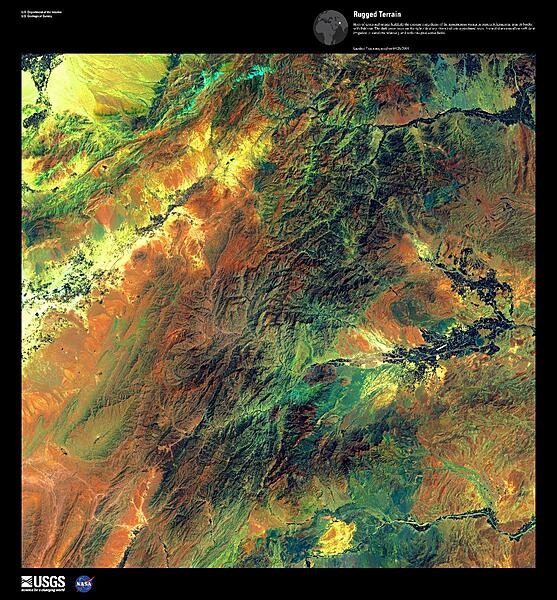 Hues of green and orange highlight the extreme ruggedness of the mountainous terrain shown in this false-color satellite image of eastern Afghanistan, near its border with Pakistan. The dark green areas on the right side along rivers indicate agricultural areas. Snow-fed streams allow sufficient irrigation to transform relatively arid soils into productive fields. Image courtesy of USGS.