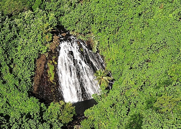 An aerial view of Keprohi Waterfall  on the island of Pohnpei. Given the high volcanic topography and heavy rainfall of Pohnpei, there are a number of scenic waterfalls on the island. Image courtesy of the US Air Force/ Tech. Sgt. Tony Tolley.