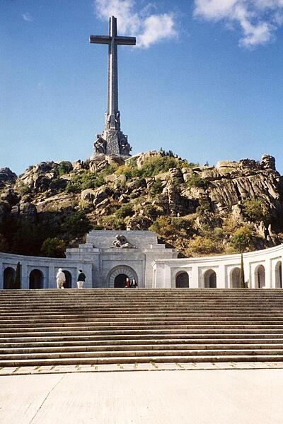 The Valle de Cuelgamuros (formally the Valle de los Caidos, or the Valley of the Fallen) in the Sierra de Guadarrama, near Madrid, Spain, is a memorial to those who died in the Spanish Civil War (1936-1939). It has one of the world's largest Catholic basilicas and the tallest memorial cross in the world.