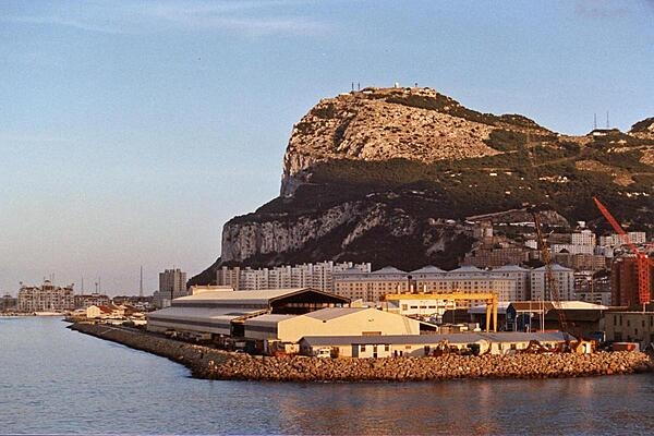 A view of the north end of The Rock of Gibraltar in the setting sun.