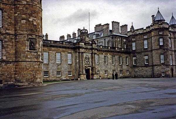 The entrance to Holyroodhouse in Edinburgh, Scotland. The castle's name comes from the Celtic words "haly" and "ruid," meaning "Holy Cross," and it is the official Scottish residence of the British monarch.