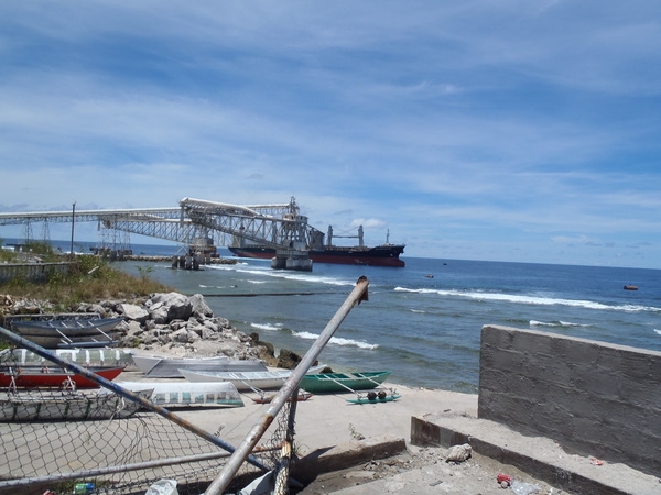 Bulk ore carrier loading phosphate on Nauru. Phosphate had been a major export commodity for Nauru, but production has declined significantly in recent years.