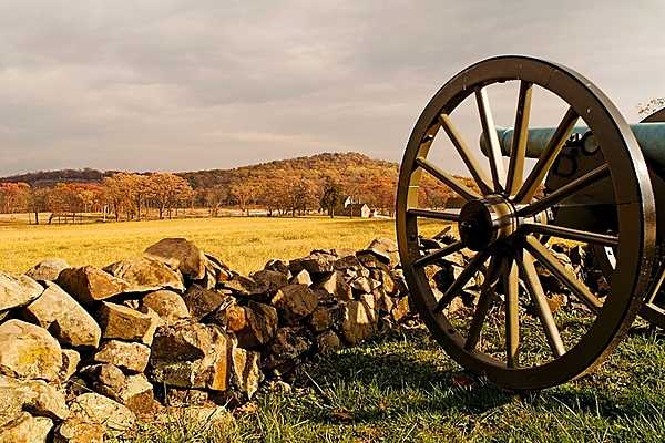 A view of the Round Tops as seen from a cannon in Gettysburg National Military Park in Gettysburg, Pennsylvania. The three-day Battle of Gettysburg (1-3 July 1863) in the US Civil War was the largest ever battle fought in the Western Hemisphere, involving roughly 175,000 Union and Confederate soldiers. Image courtesy of the US National Park Service.