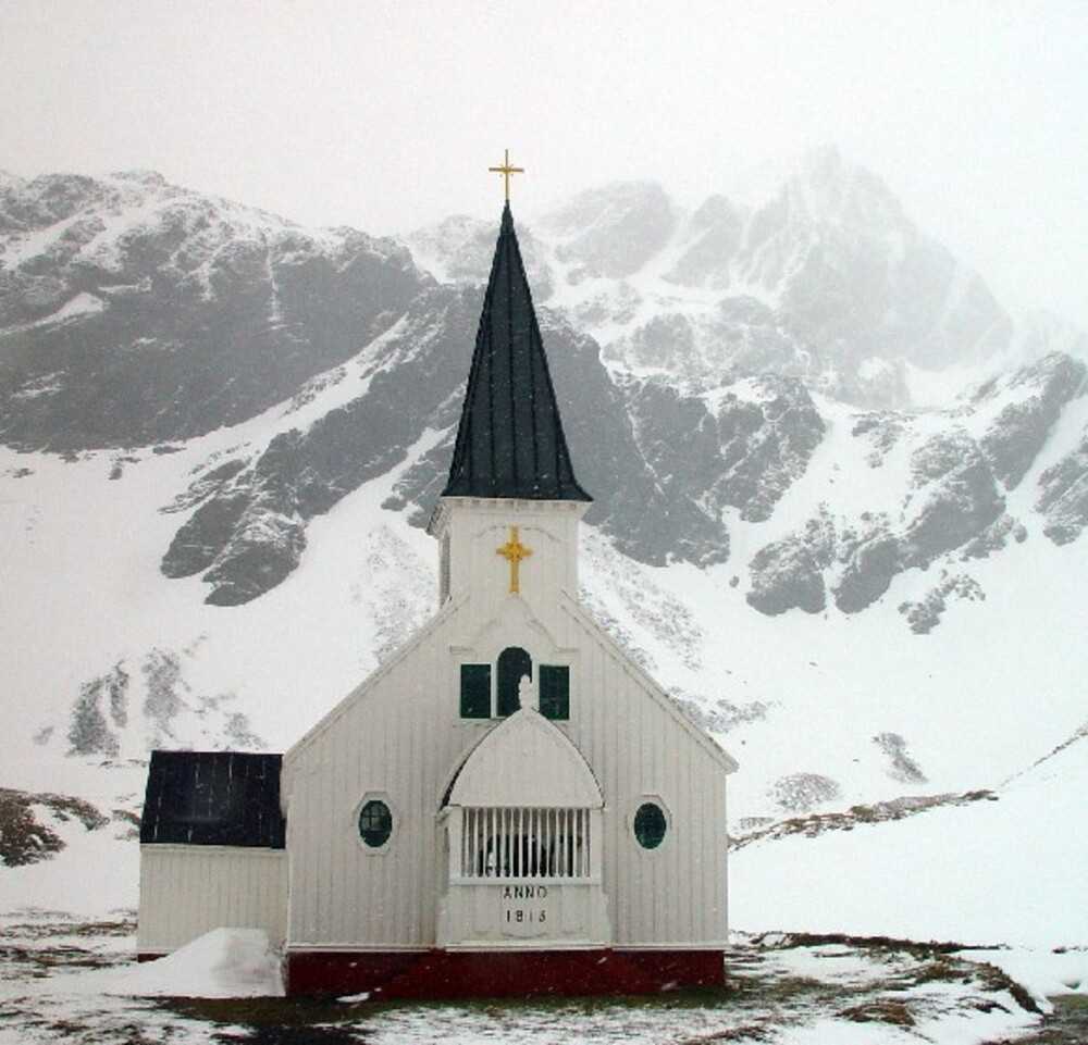 The Norwegian Anglican Church (the Whalers Church) was built in 1913 in Grytviken on South Georgia Island in the South Atlantic Ocean. One of the world's southernmost churches, the Neo-Gothic wooden structure was originally part of the Church of Norway but was transferred to the Church of England in 2013. Famed Antarctic explorer Ernest Shackleton’s funeral service was held in the church after he died in South Georgia while on an expedition in 1922, and he is buried in the nearby cemetery. The church, owned by the UK government and managed by the South Georgia Museum, still holds services and weddings