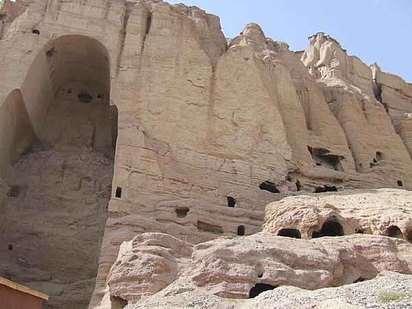 View of the shell of the &quot;Large Buddha&quot; and surrounding caves in Bamyan. The Buddha statue in this cave as well as in another - both dating to the sixth century A.D. - were frequently visited and described over the centuries by travelers on the Silk Road. Both statues were destroyed by the Taliban in 2001.