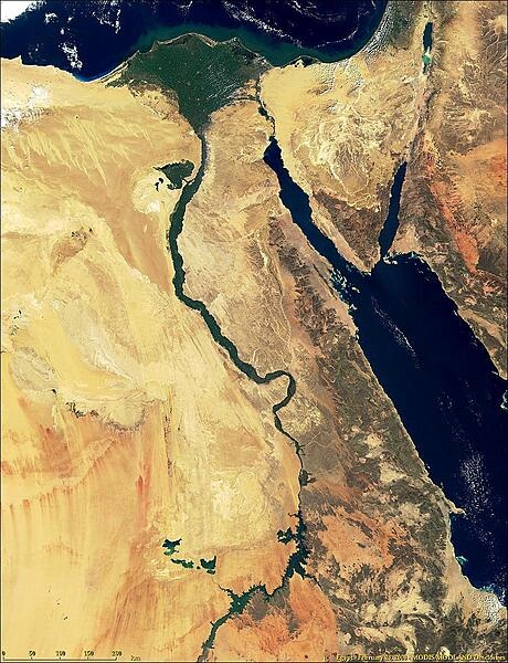 A remarkably detailed satellite image of Egypt vividly displays the winding Nile River and its distinctive delta. The Sinai peninsula and Red Sea are on the right. Photo courtesy of NASA.