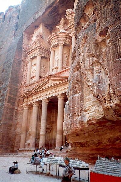 The ruins at Petra are justifiably famous worldwide and a UNESCO World Heritage Site. Petra was the capital of the Nabatean Kingdom, which flourished from the third century B.C. until its incorporation into the Roman Empire in A.D. 106. The photo shows one of Petra's most elaborate buildings, the "Treasury" (Al-Khazneh), which was carved into the red-hued cliff face in the 2nd century B.C. In actuality, the structure was likely the mausoleum of a Nabatean king.