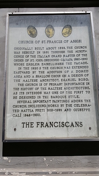 Plaque outside of the Saint Francis of Assisi Church in Valletta. Completed in 1598, the church was rebuilt in 1681 to correct structural problems. In the 1920’s, it was enlarged to include a dome. With its fine pipe organ built in 1932 and restored in 2014, Saint Francis often serves as one of the sites for the Malta International Organ Festival.