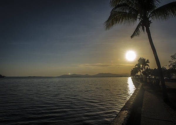 The sun rises over the horizon as waves lap the seawall in Lautoka, the second largest city in Fiji. Lautoka is on the west coast of the island of Viti Levu, in the Ba Province. Photo courtesy of the US Air Force/ Tech. Sgt. Benjamin Stratton.