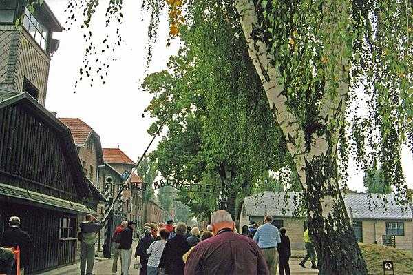 Entrance to the Auschwitz I concentration camp in Poland. The slogan over the gate translates as "Work makes you free." At the end of World War II, the Polish Government established a memorial museum to honor the more than 1 million victims who died at this and surrounding camps.