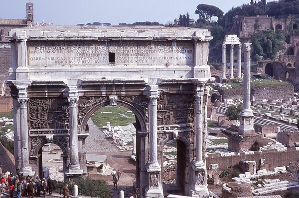 The Arch of Septimius Severus, located in the Forum in Rome, Italy, is a triumphal arch built by the Emperor Septimius Severus to commemorate his victory over the Parthian Empire. Completed in A.D. 203, the monument is almost 21 meters high, over 23 meters wide, and faced with white marble.