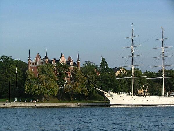 Admiralty House (built 1647-50) on the islet of Skeppsholmen in central Stockholm. Formerly occupied by the Royal Swedish Navy, it today houses the Swedish Tourist Association. The steel, full-rigged ship is the &quot;af Chapman.&quot; Built in the UK in 1888, it served as a training ship and made several trips around the world. No longer in active service, it presently is a youth hostel.