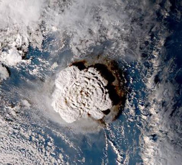 On 14 January 2022, the uninhabited volcanic island of Hunga Tonga once more erupted. Located 65 km (40 mi) north of Tongatapu, Tonga's main island, it is part of the highly active Tonga–Kermadec Islands volcanic arc. The eruption caused damaging tsunamis along the entire rim of the Pacific Ocean and was the largest of the 21st century to that date. The satellite photo shows the volcanic cloud from directly overhead just hours after the start of the eruption. Image courtesy of the Japan Meteorological Agency.