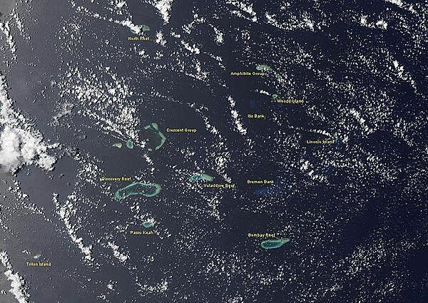 This satellite panorama encompasses both island groups of the Paracel Islands. Image courtesy of NASA.