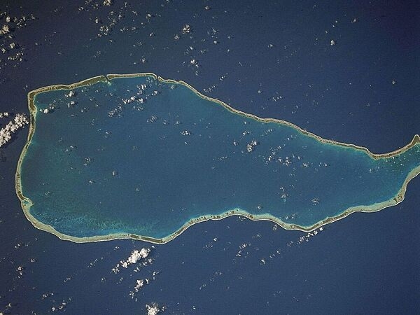 Located about 355 km (220 mi) northeast of Tahiti, Rangiroa Atoll in the Tuatomus is one of the largest atolls in the world. Image courtesy of NASA.