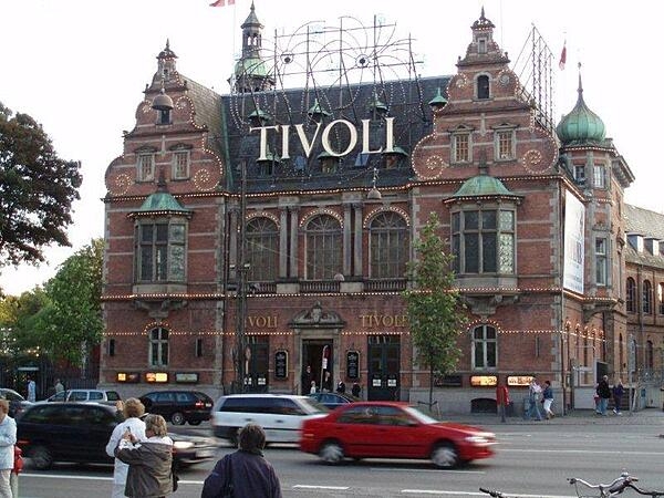 The Hans Christian Andersen Castle serves as one of the entrances to the Tivoli Gardens in Copenhagen. Opened in 1843, the Gardens are one of the oldest amusement parks in the world and feature open-air concerts, dancing, numerous cafes and restaurants, and, of course, amusement park rides.