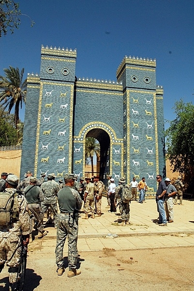 Soldiers and civilians prepare to enter the ancient city of Babylon for a tour. The entrance to the ruins is a reconstruction of the Ishtar Gate. The original gate - built by Nebuchadnezzar II in 575 B.C. and dedicated to Ishtar, the goddess of love and war - was dismantled by German archeologists in the early 20th century and reconstructed in the Pergamon Museum in Berlin. Photo courtesy of the US Department of Defense/ Sgt. Debralee Best.