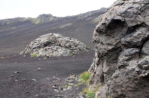 Pyroclastic rock bombs scattered about a crater in the Hekla Mountain Range.
