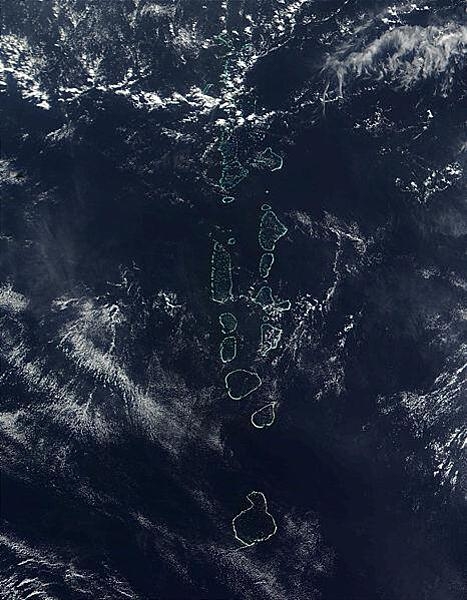 All but the southernmost of the Maldives many atolls, Addu Atoll, is visible in this 2006 space-based image. Photo courtesy of NASA.