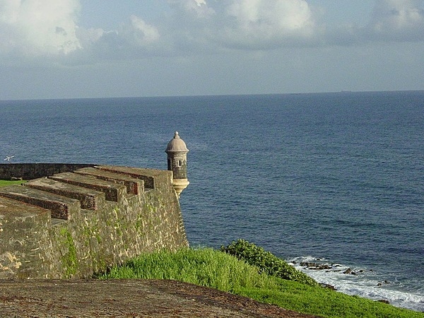 View of a garita – a bartizan or overhanging, wall-mounted turret - projecting from the walls of El Morro. Photo courtesy of the US National Park Service.