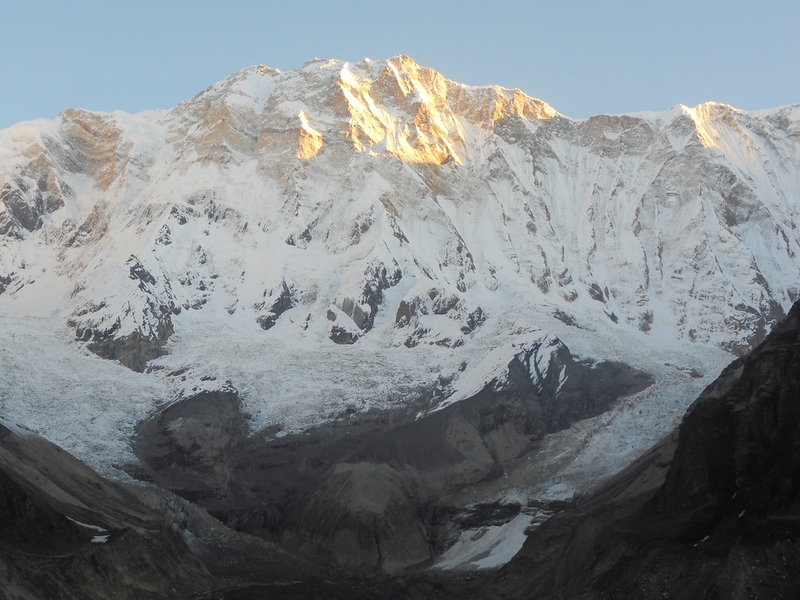 The south face of the Annapurna Massif in the Annapurna Conservation Area in Nepal. The highest peak of the massif, Annapurna I Main, is the tenth highest mountain in the world at 8,091 m (26,545 ft) above sea level.
