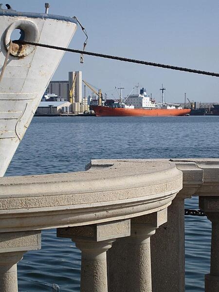 Tripoli Harbor is a study in contrasts, with significant industrial shipping taking place adjacent to a broad recreational riverwalk, popular with Tripoli residents of all ages.