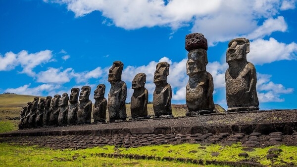 Located in the southeastern Pacific Ocean, Easter Island was discovered by Dutch sailors on Easter Sunday 1722 and named for the holy day, but island's indigenous name is Rapa Nui. The island is known for the nearly 900 statues (moai), such as the ones pictured, that the original Polynesian inhabitants carved.  What or who the statues represent remains a mystery.