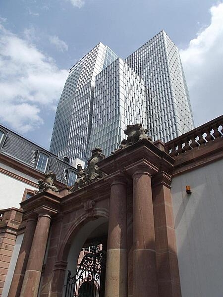 An 18th century archway of the Palais Thurn und Taxis and 21st century skyscrapers (Nextower) provide for an interesting architectural juxtaposition in Frankfurt.
