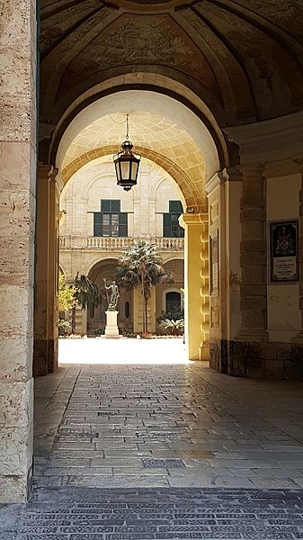 A view of the statue of Neptune in the Presidential Palace courtyard in the center of  Malta's capital city, Valletta. The Palace is the official office of the president of the Republic of Malta and has been the seat of authority in Malta since the 16th century, when it was known as the Magistral Palace.