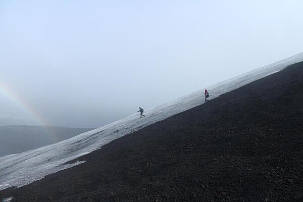 Descent down Hekla across the snowpack. Hekla is an active volcano located in the south of Iceland; it is 1,491 m (4,892 ft) high.