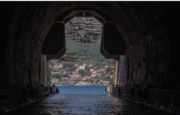 During World War II, the Yugoslav Army built several boat tunnels to hide and repair submarines around Kotor Bay in Montenegro.