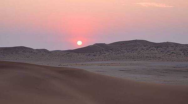 The Namib Desert, for which Namibia is named, is a cool coastal desert running 1,900 km (1,200 mi) along Africa’s Atlantic coast, through Angola, Namibia, and South Africa. The name “Namib” is derived from the Nama language and means “an area where there is nothing.”