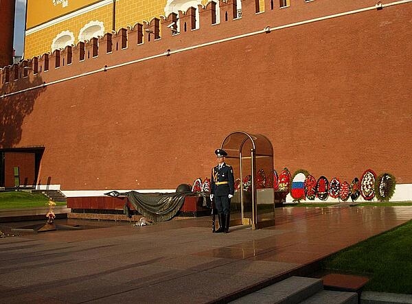 The Tomb of the Unknown Soldier in Moscow, Russia, is a war memorial dedicated to Soviet soldiers killed during World War II. First unveiled in 1967, the eternal flame emanates from the center of a five-pointed star located in front of the tombstone.
