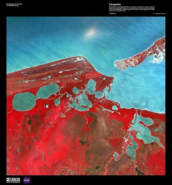 Named after the ancient Mayan Province of Kimpech, the state of Campeche comprises much of the western half of Mexico&apos;s Yucatan Peninsula. Rivers in southern Campeche drain into the immense Terminos Lagoon, the entrance to which is protected by a long barrier island, Isla Del Carmen (upper right). In this false-color satellite image the green jungle canopy shows up as bright red. Image courtesy of USGS.