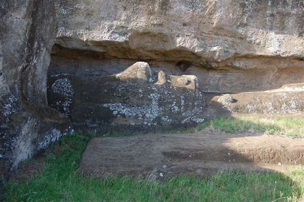 An incomplete “reclining” moai at the Rano Raraku quarry on Easter Island (Rapa Nui). The indigenous civilization collapsed, leaving partially completed monuments. Image courtesy NOAA / Elizabeth Crapo.