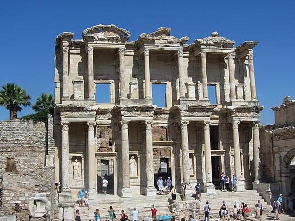 The Library of Celsus in Ephesus was built between A.D. 100 and 110 by Gaius Julius Aquila in memory of his father, Tiberius Julius Celsus Polemaneanus, a former governor of Roman Asia, who is buried under the library. The library held 1,200 scrolls and was built facing east to make the best use of morning light; it was destroyed by an earthquake in A.D. 270. The facade was reconstructed between 1970 and 1978.