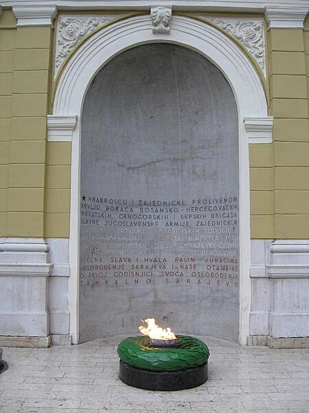 A closer view of the Eternal Flame Memorial in Sarajevo honoring the military and civilian victims of World War II.